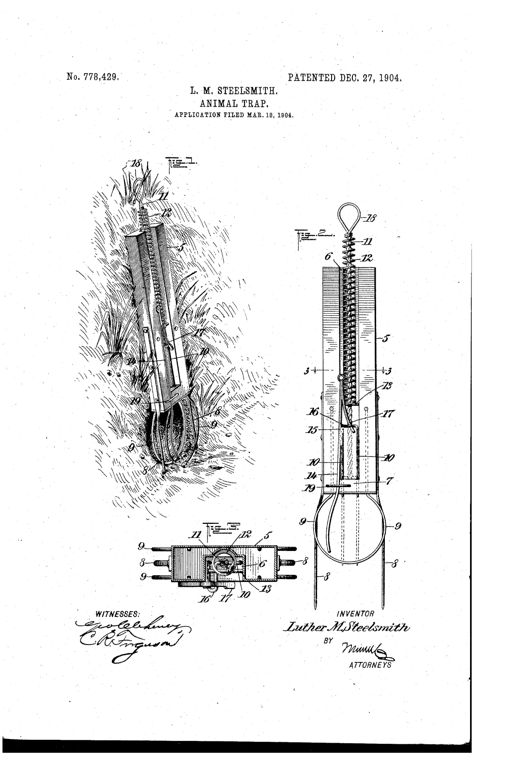 Patent drawing of an elongated metal animal trap with a coiled spring inside a channel, a top pull-loop, downward puncturing prongs, ground-anchoring spikes, and two circular loops at the base sized to a burrow opening, shown both set in grassy ground and in isolated front/side views.